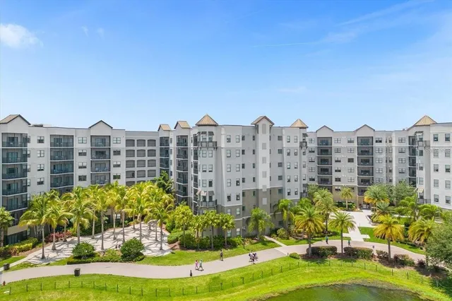 a view of swimming pool with outdoor seating