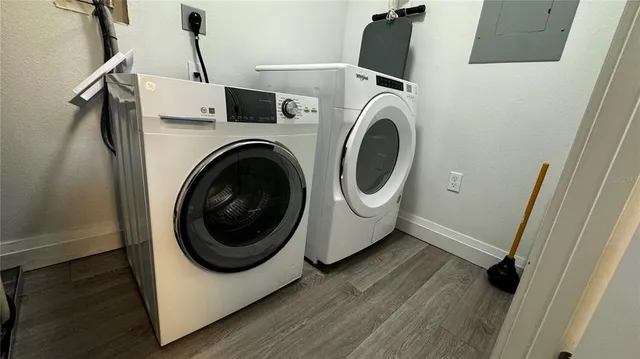 a utility room with dryer and washer