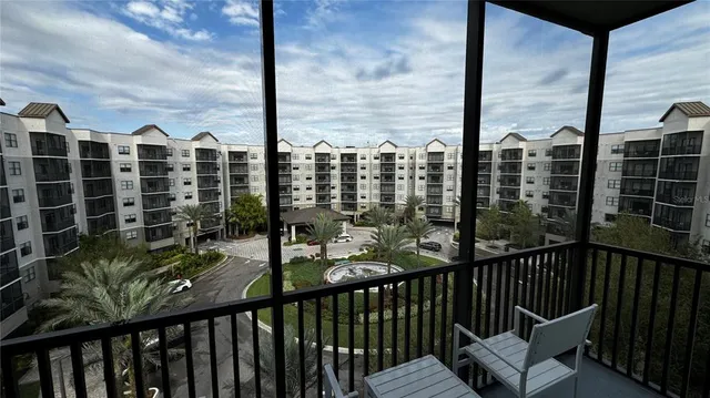 a view of a balcony with wooden floor