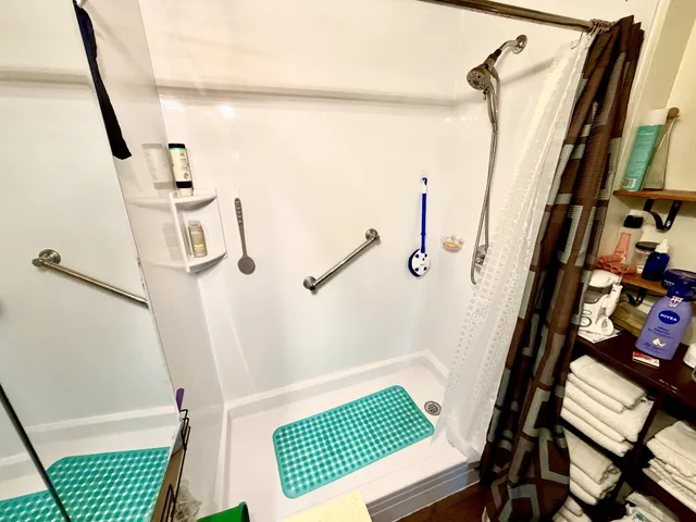 a view of a room with door and stairs