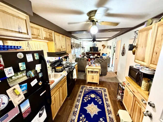 a very nice looking room with many windows and furniture