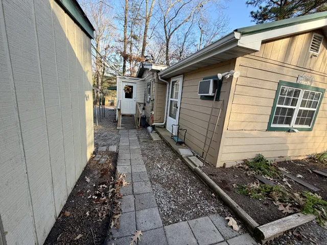 a view of a back yard of the house