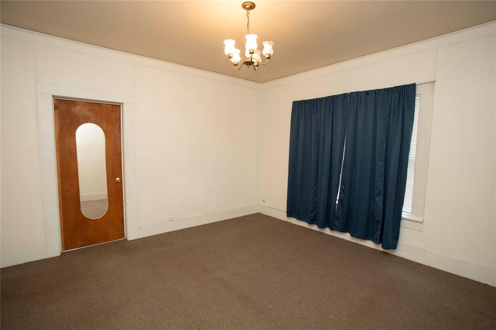 1311 Loving Highway Graham, TX 76450 - Photo 14 of 31 an empty room with windows