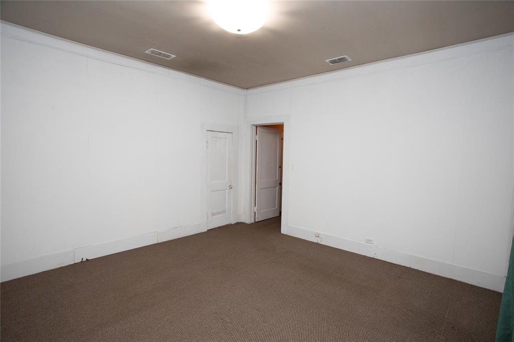 1311 Loving Highway Graham, TX 76450 - Photo 17 of 31 a view of an empty room