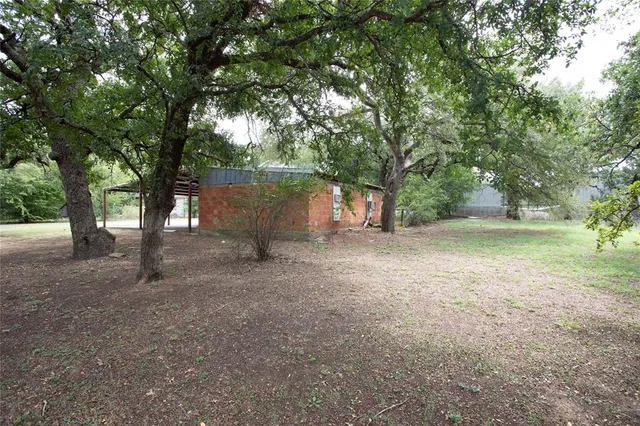 a view of outdoor space and yard