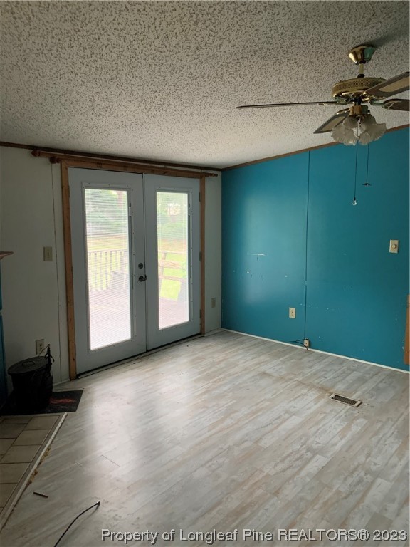 6400 Waldos Beach Road Fayetteville, NC 28306 - Photo 16 of 29 a view of a livingroom with a ceiling fan and window