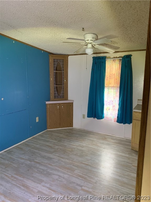 6400 Waldos Beach Road Fayetteville, NC 28306 - Photo 19 of 29 a view of wooden floor and windows in a room
