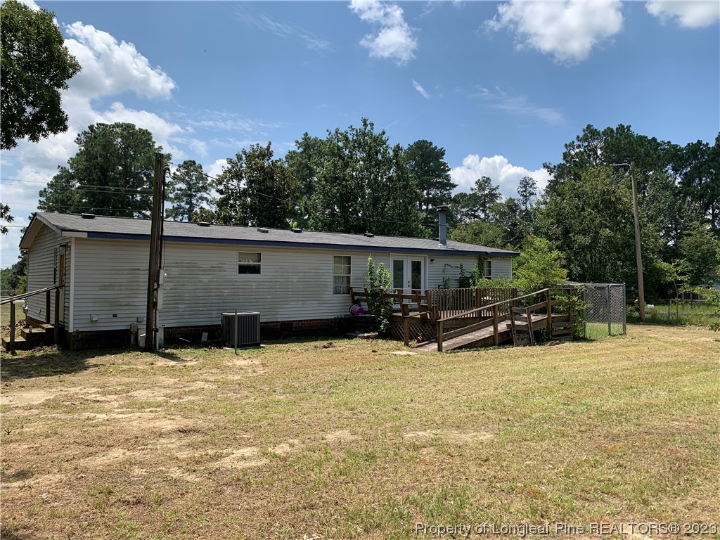 6400 Waldos Beach Road Fayetteville, NC 28306 - Photo 2 of 29 a view of a house with yard and sitting area