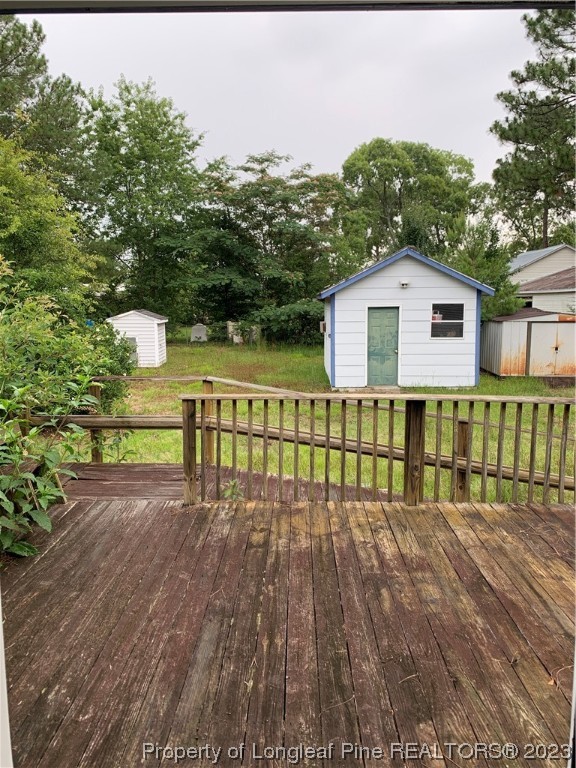 6400 Waldos Beach Road Fayetteville, NC 28306 - Photo 27 of 29 a view of a house with a wooden fence