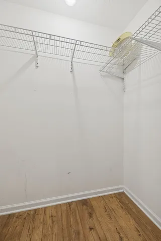 a view of a room with racks on the wall