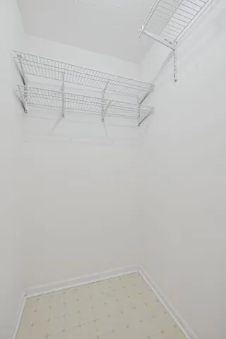 a view of a room with racks on the wall