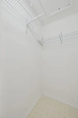 a view of a room with racks on the wall