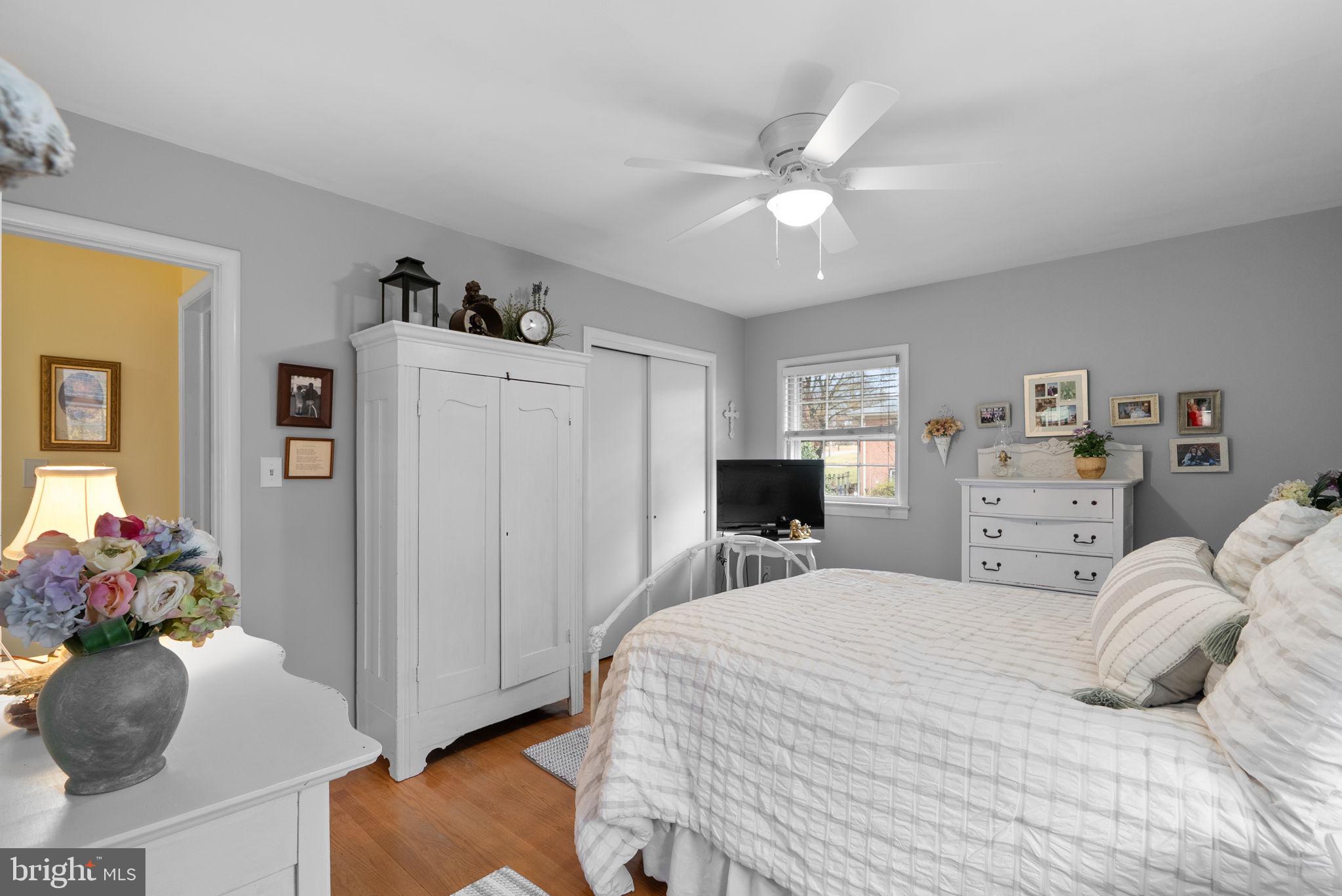 14004 Zeigler Way Silver Spring, MD 20904 - Photo 22 of 57 a bedroom with a bed and a chandelier