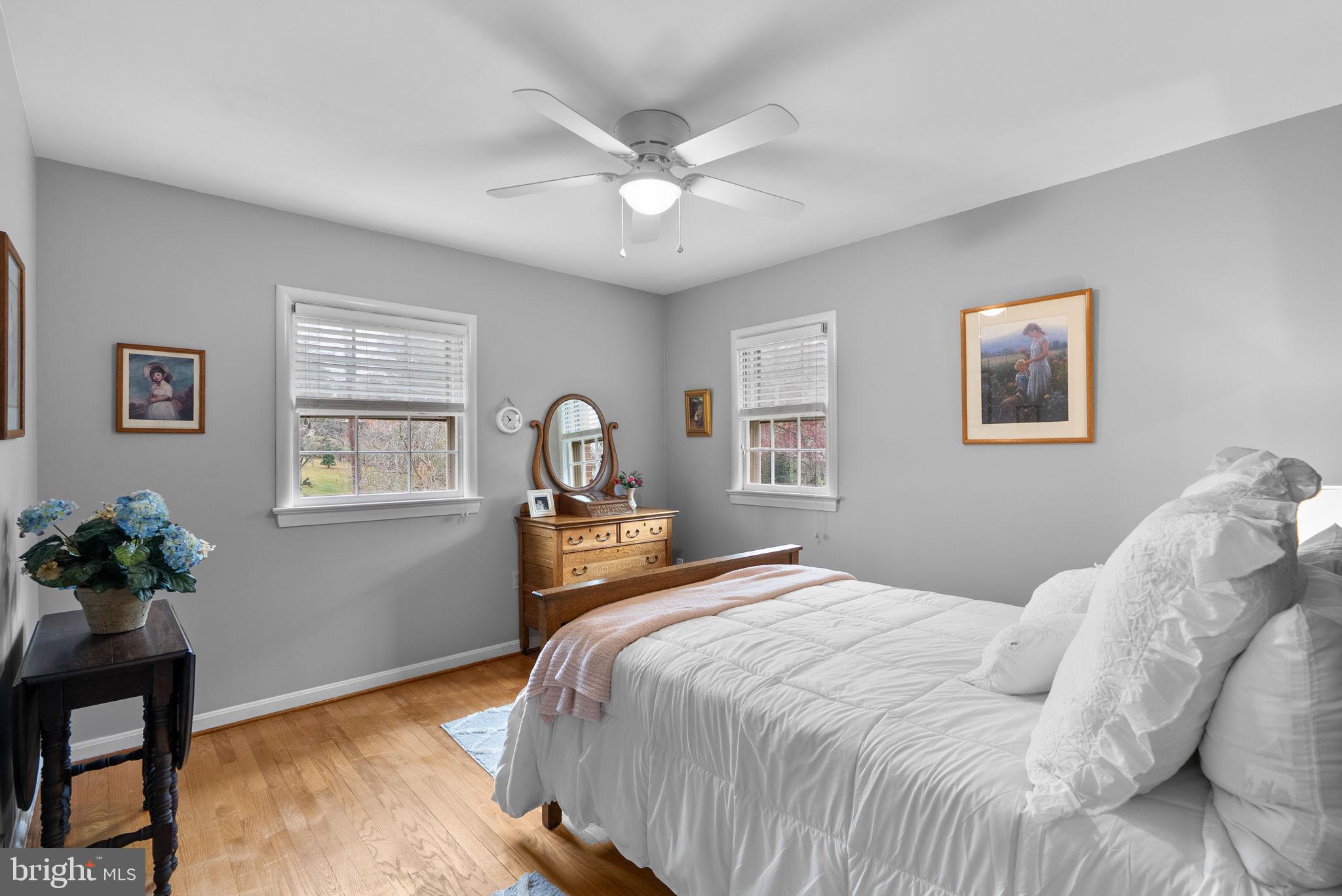 14004 Zeigler Way Silver Spring, MD 20904 - Photo 26 of 57 a bedroom with a bed and a chandelier