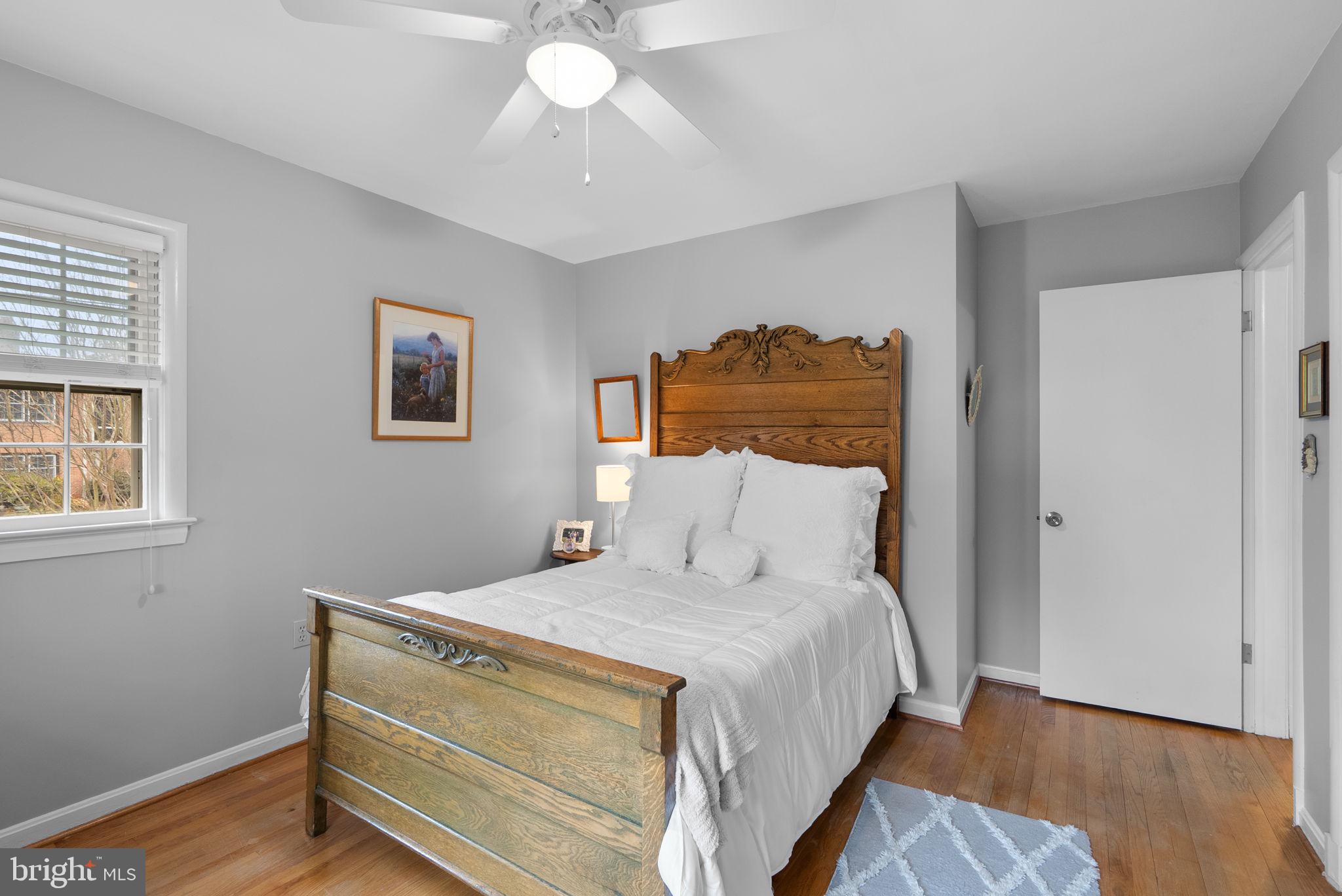 14004 Zeigler Way Silver Spring, MD 20904 - Photo 27 of 57 a bedroom with a bed and wooden floor
