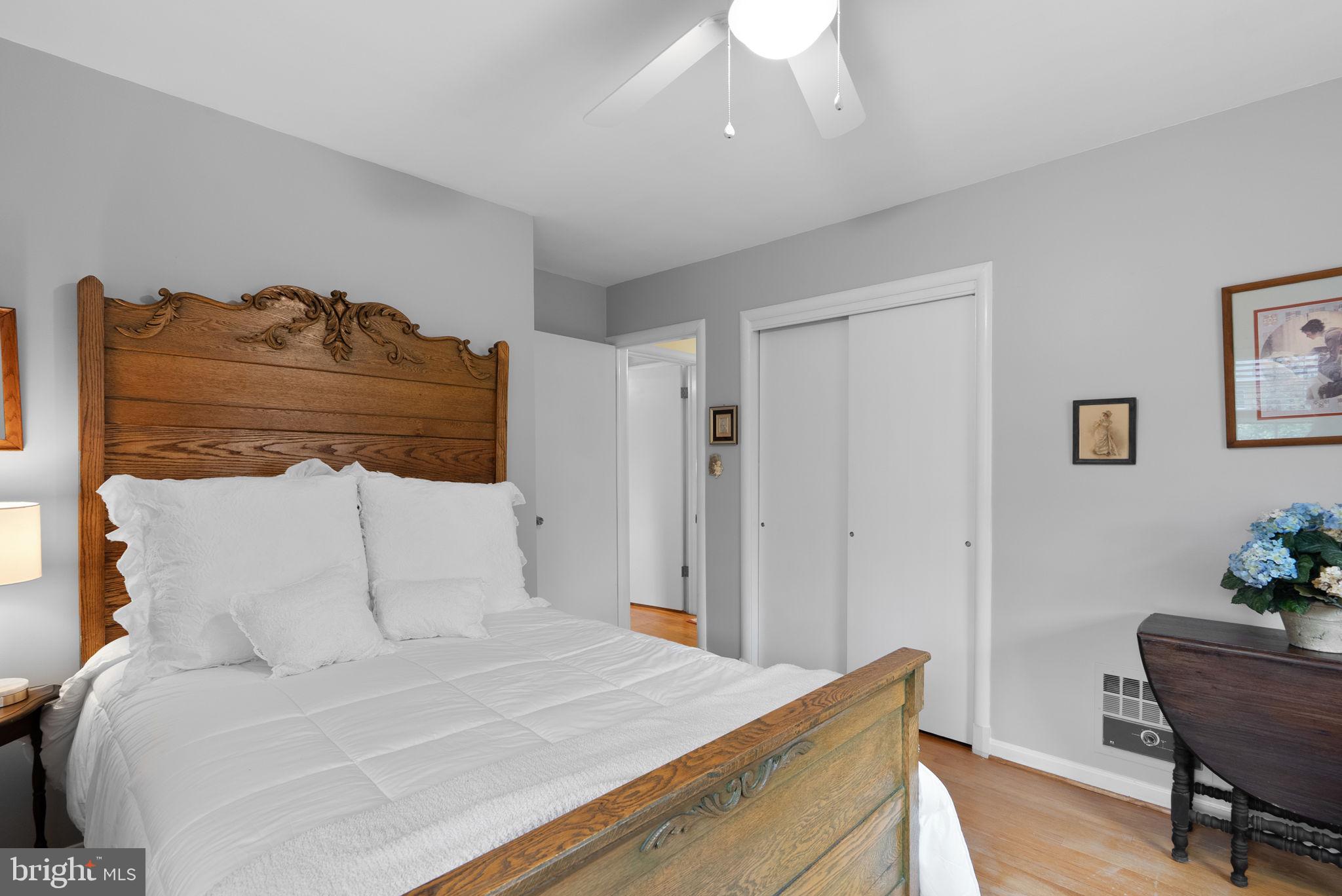14004 Zeigler Way Silver Spring, MD 20904 - Photo 28 of 57 a bedroom with a bed and a table in it