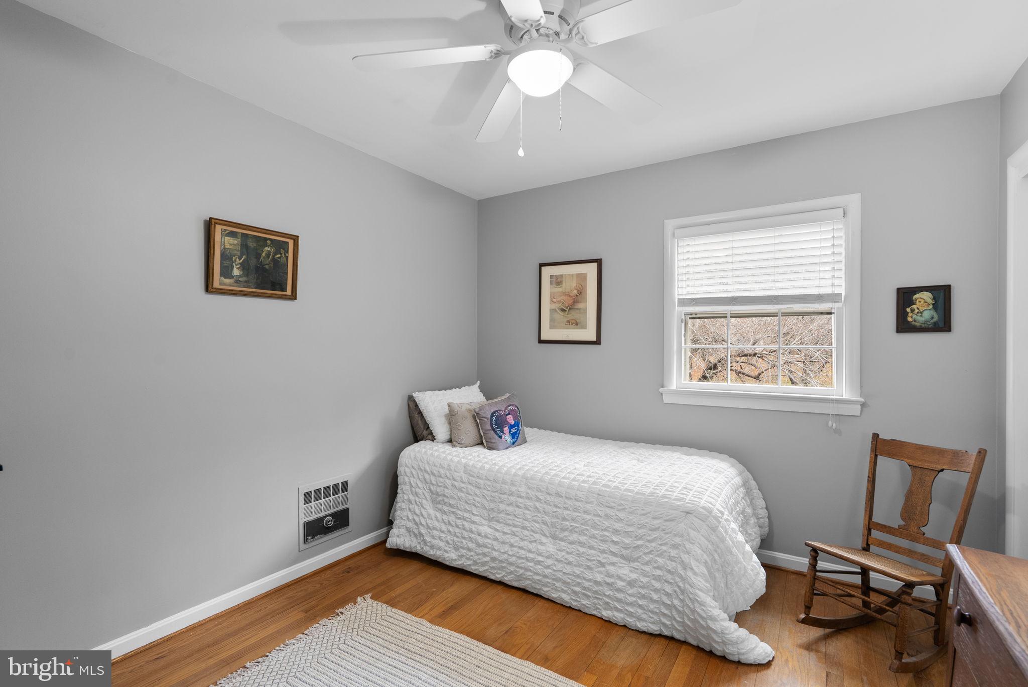 14004 Zeigler Way Silver Spring, MD 20904 - Photo 29 of 57 a bedroom with a bed and a window