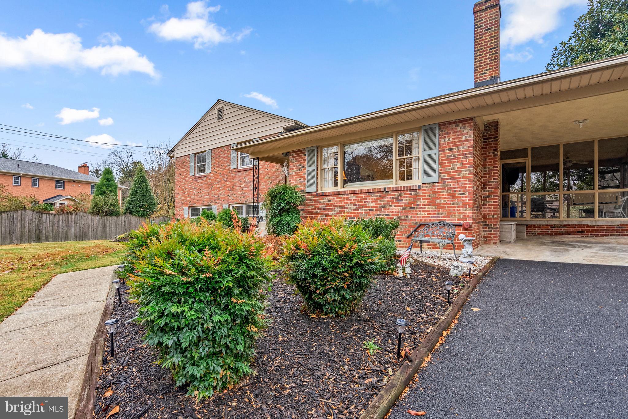 14004 Zeigler Way Silver Spring, MD 20904 - Photo 45 of 57 a front view of a house with garden