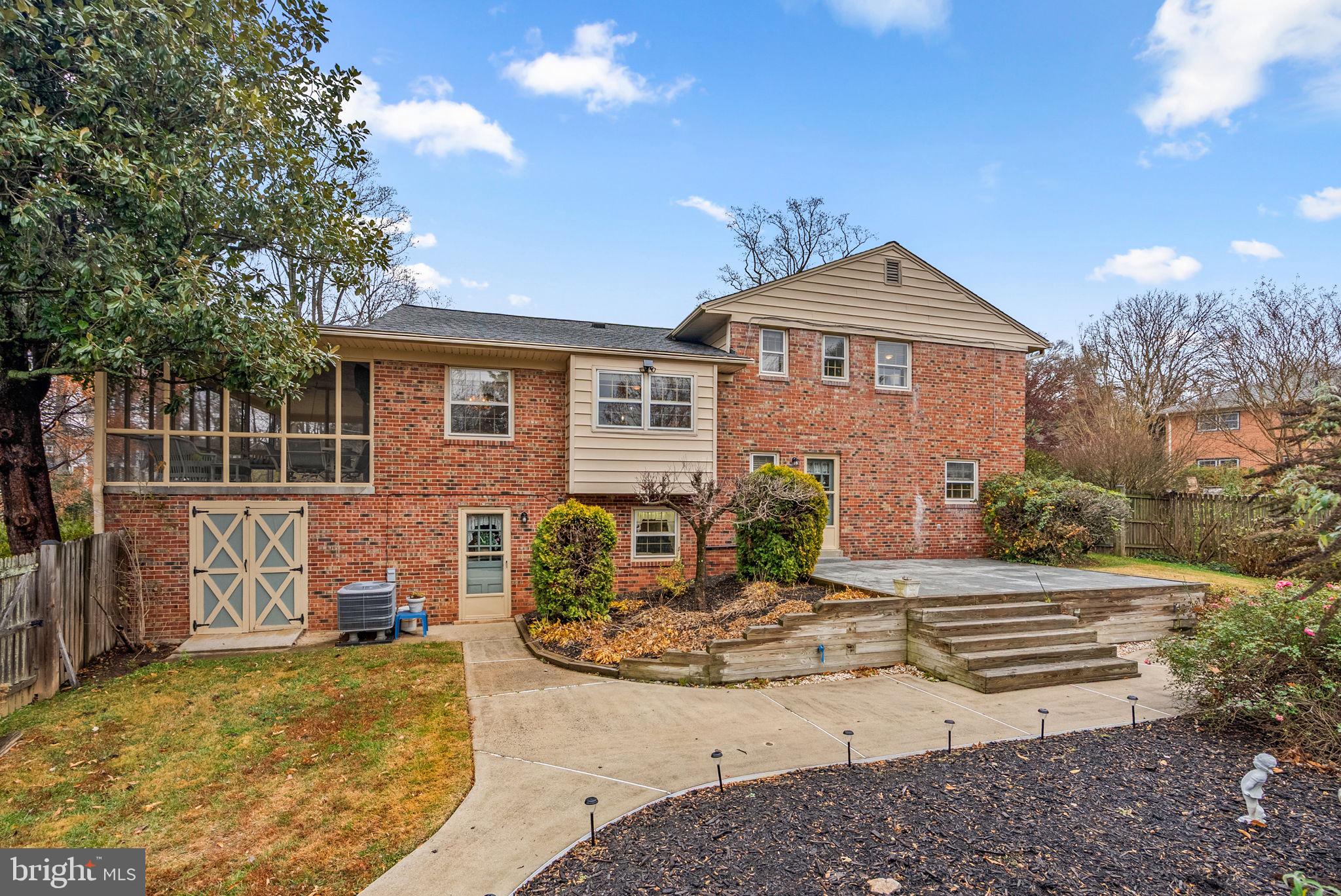 14004 Zeigler Way Silver Spring, MD 20904 - Photo 47 of 57 a front view of a house with garden