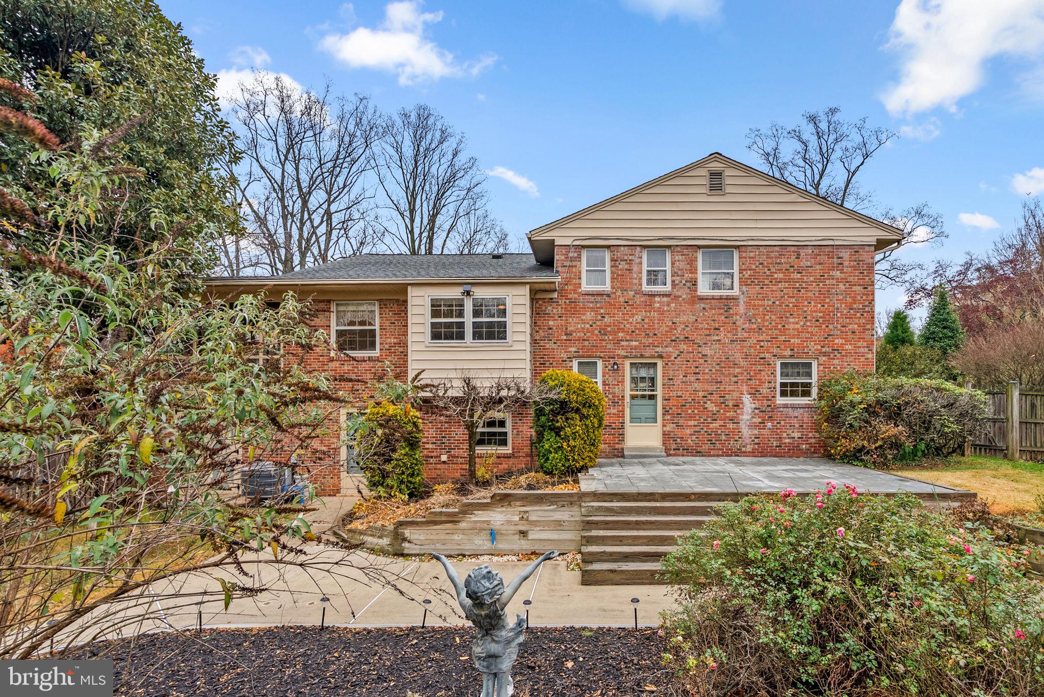 14004 Zeigler Way Silver Spring, MD 20904 - Photo 48 of 57 a front view of a house with garden