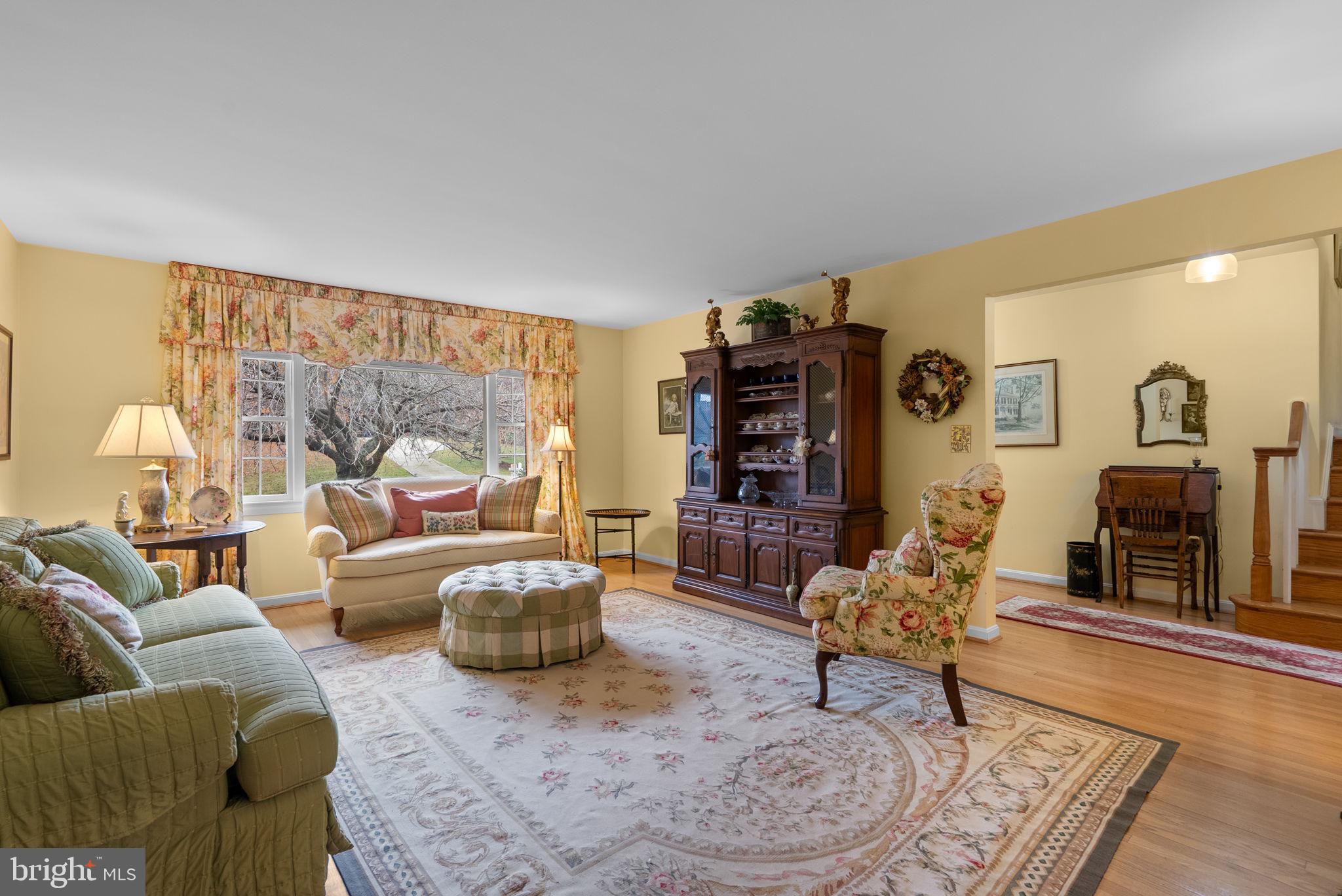 14004 Zeigler Way Silver Spring, MD 20904 - Photo 56 of 57 a living room with furniture and a fireplace
