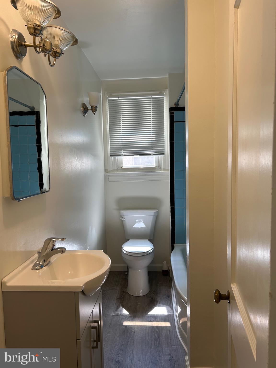 206 West Gay Street, Unit 1 West Chester, PA 19380 - Photo 12 of 14 a bathroom with a sink toilet and shower