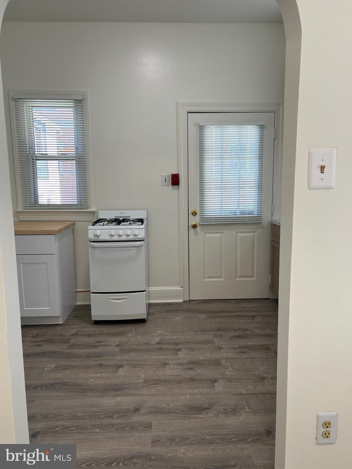 206 West Gay Street, Unit 1 West Chester, PA 19380 - Photo 4 of 14 a view of a kitchen with a sink cabinets and a window