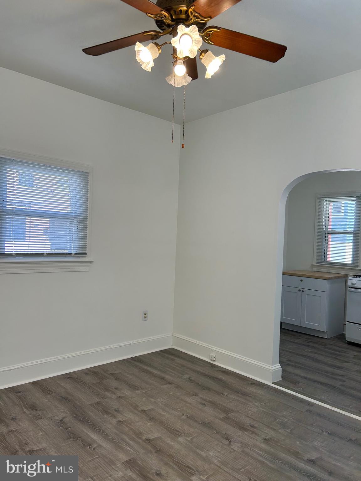206 West Gay Street, Unit 1 West Chester, PA 19380 - Photo 10 of 14 a view of an empty room with wooden floor and a window