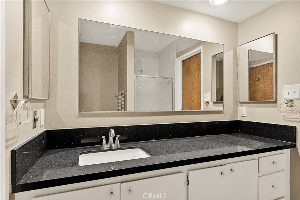966 Willow Creek Road, Unit 9 Lake Arrowhead, CA 92352 - Photo 14 of 24 a bathroom with a sink and a bathtub