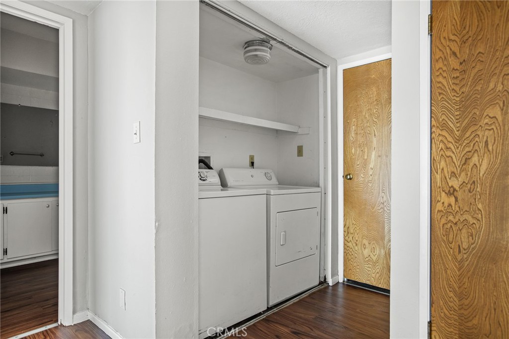966 Willow Creek Road, Unit 9 Lake Arrowhead, CA 92352 - Photo 20 of 24 a room with a washer and dryer