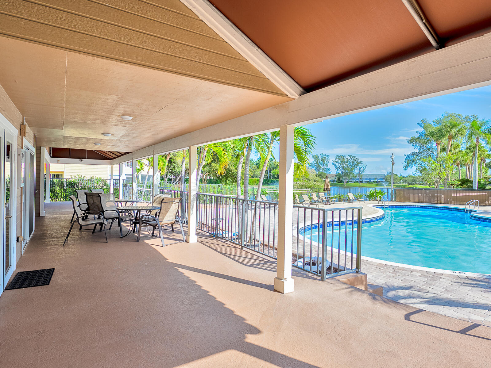 5124 Point Alexis Boca Raton, FL 33431 - Photo 16 of 21 a view of a porch with chairs and backyard