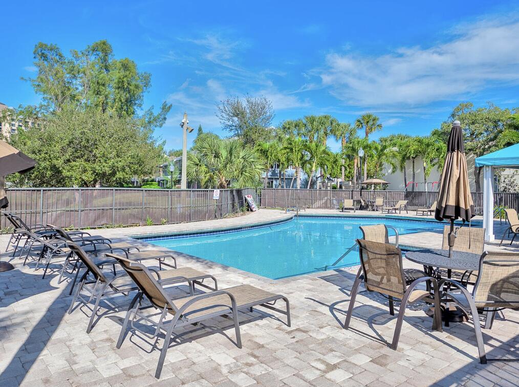 5124 Point Alexis Boca Raton, FL 33431 - Photo 20 of 21 a view of a backyard with sitting area