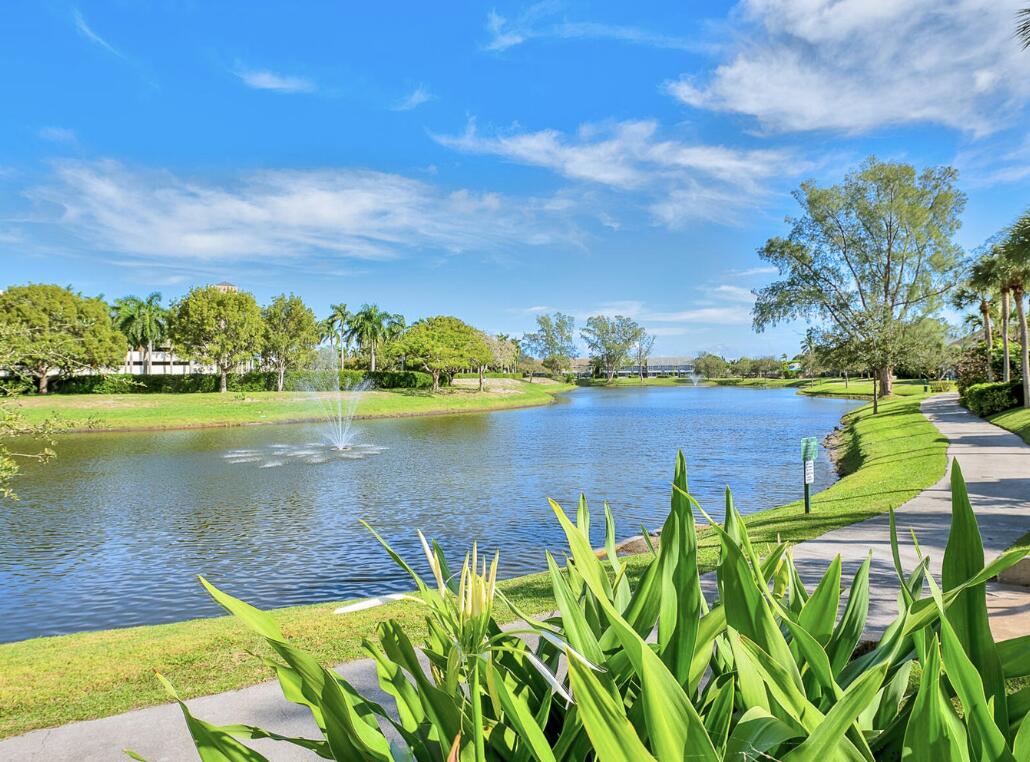 5124 Point Alexis Boca Raton, FL 33431 - Photo 21 of 21 a view of a lake with houses in the back
