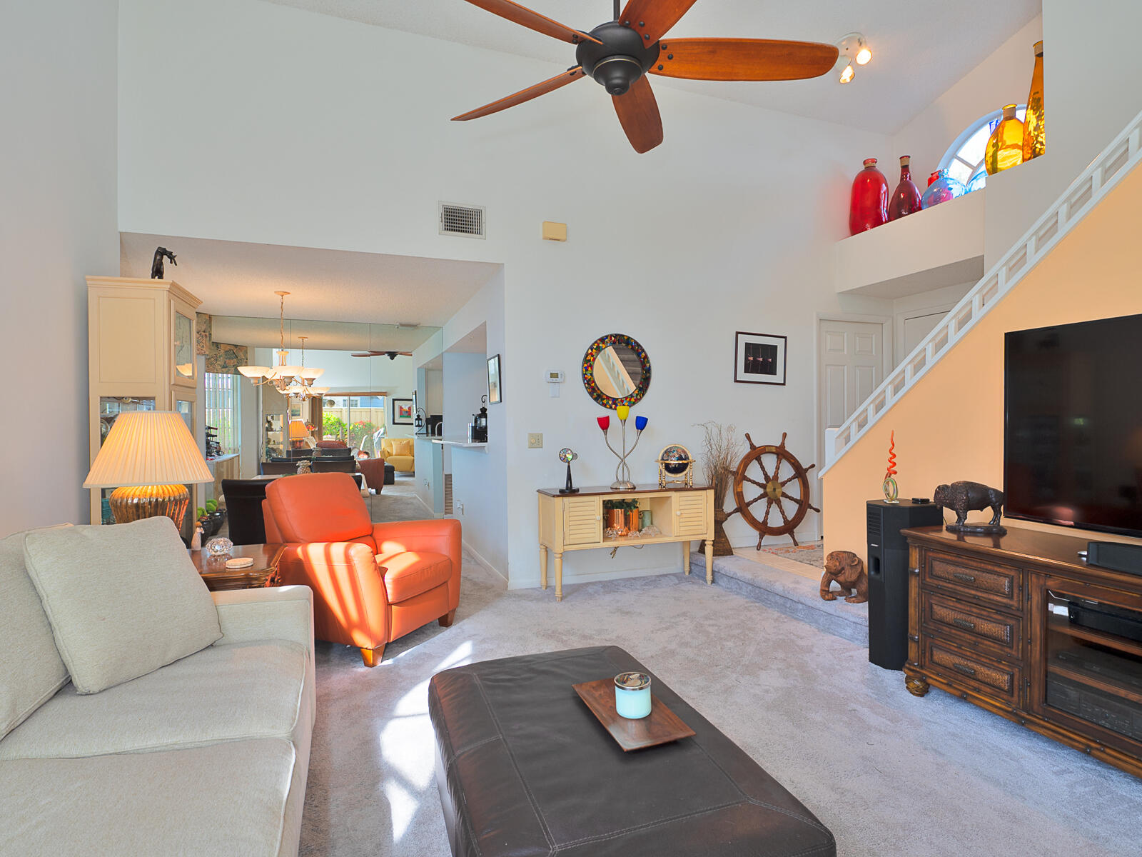 5124 Point Alexis Boca Raton, FL 33431 - Photo 3 of 21 a living room with furniture and a flat screen tv