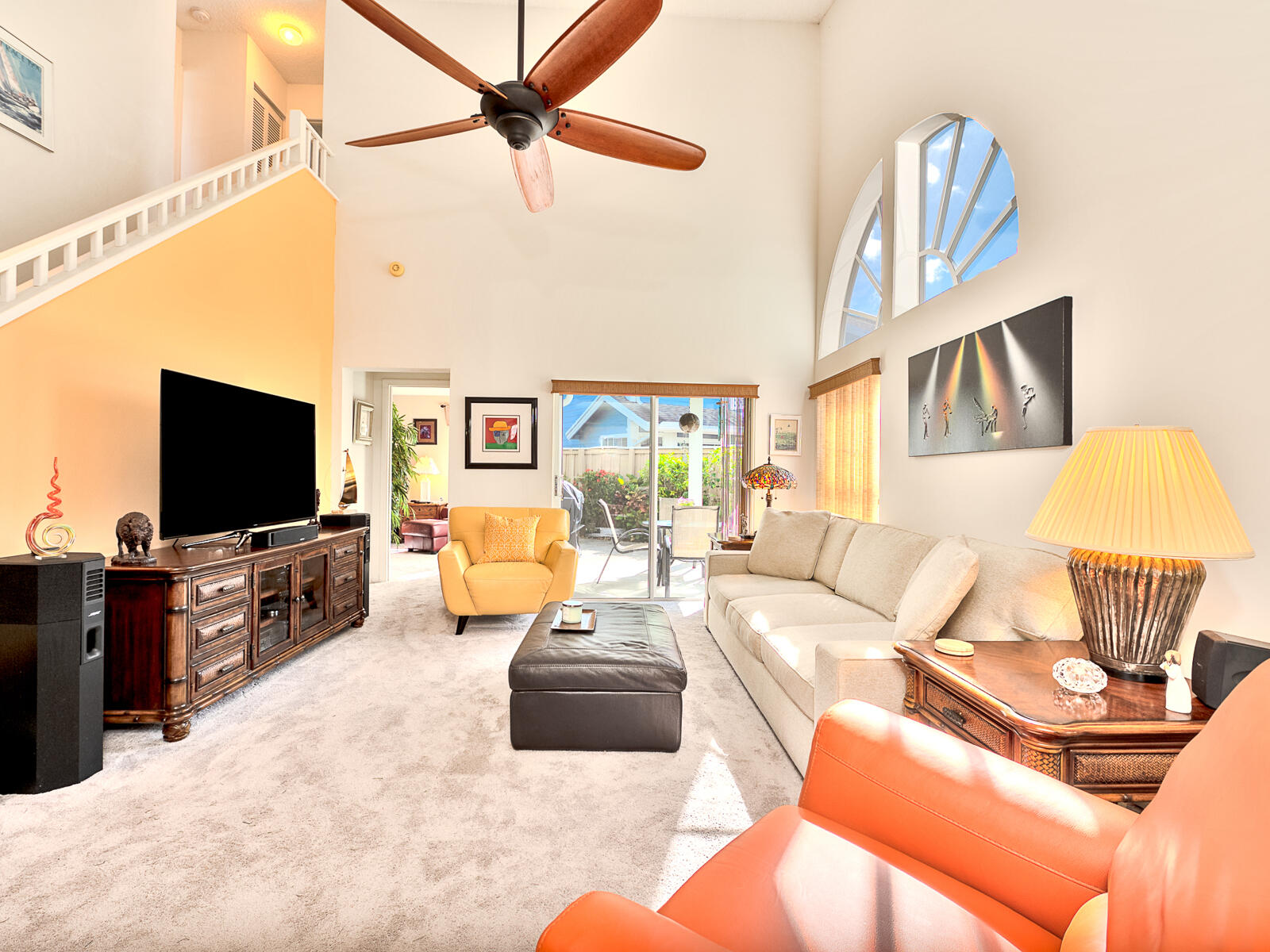 5124 Point Alexis Boca Raton, FL 33431 - Photo 4 of 21 a living room with furniture and a flat screen tv