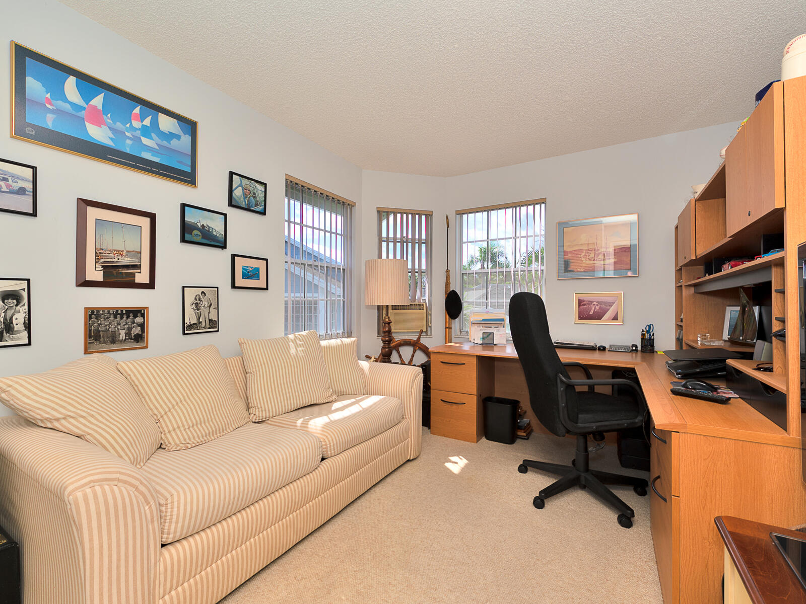 5124 Point Alexis Boca Raton, FL 33431 - Photo 10 of 21 a view of a livingroom with workspace and a couch