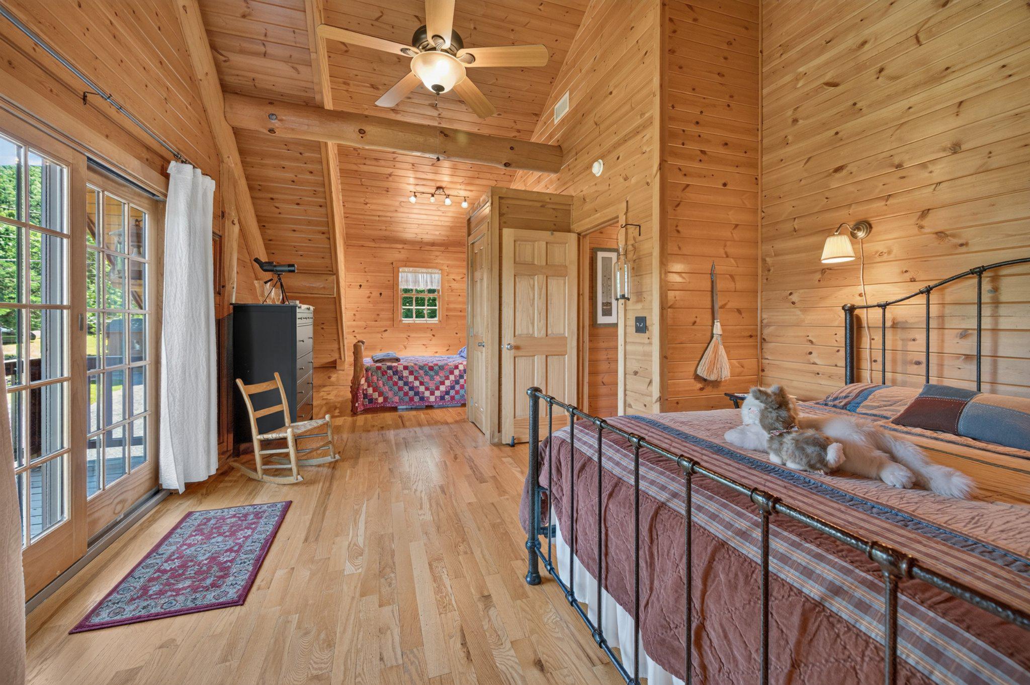 2199 Cheyennes Trail Gerrardstown, WV 25420 - Photo 30 of 63 Second floor bedroom w/ two beds and balcony view