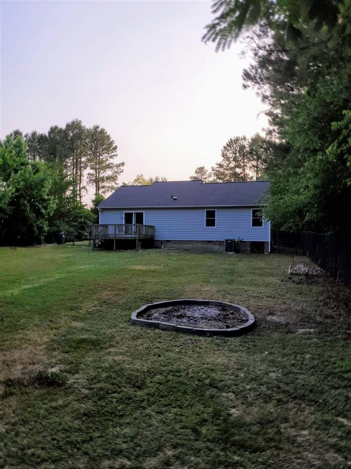 7924 Ligon Mill Road Wake Forest, NC 27587 - Photo 27 of 29 Backyard with fire ring for evening s'mores