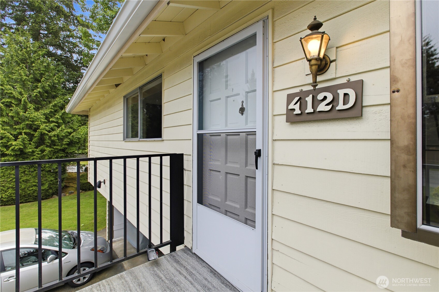 412 213th Place Southwest, Unit 21D Bothell, WA 98021 - Photo 5 of 28 a view of a street sign and a street