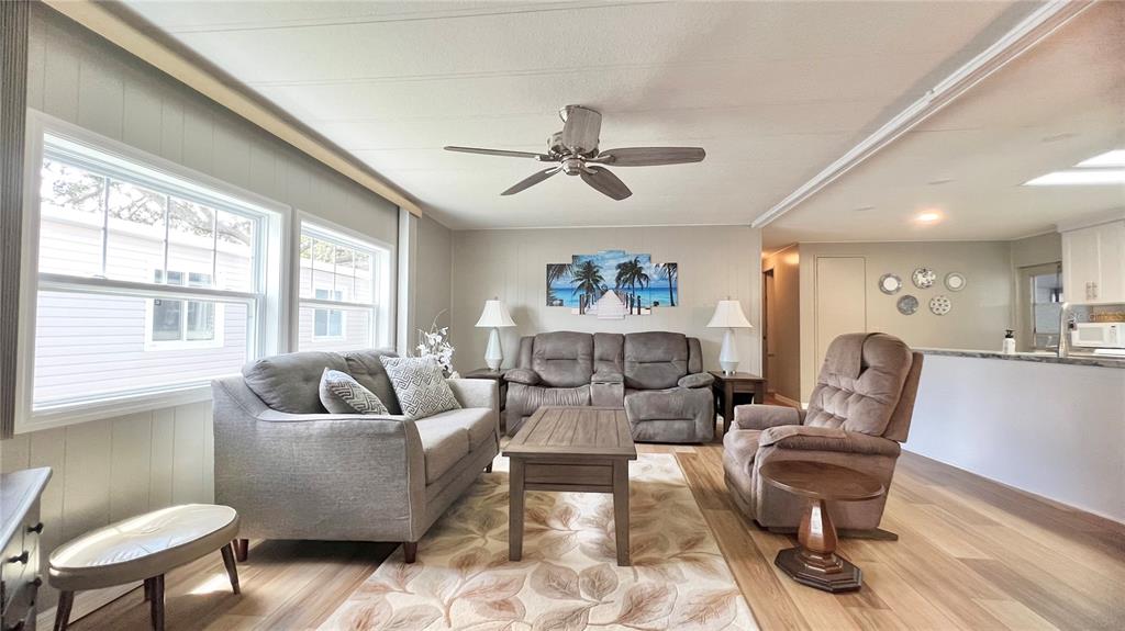 1100 South Belcher Road, Unit 657 Largo, FL 33771 - Photo 23 of 81 a living room with furniture and a large window