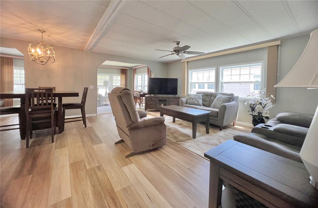1100 South Belcher Road, Unit 657 Largo, FL 33771 - Photo 30 of 81 a living room with furniture and a wooden floor