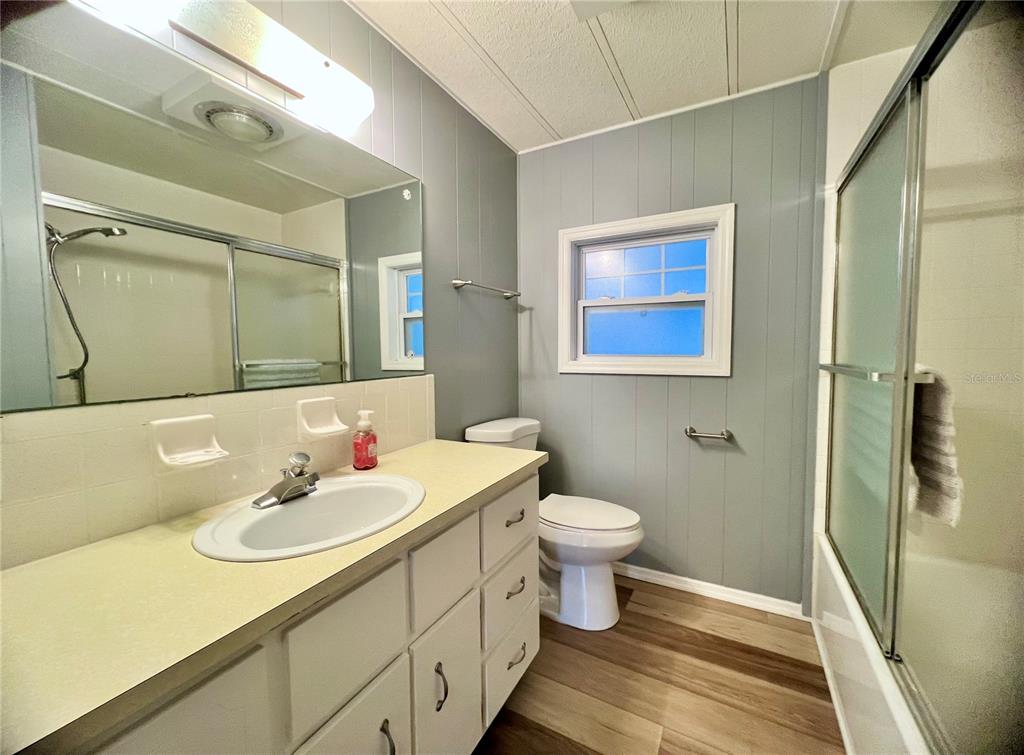 1100 South Belcher Road, Unit 657 Largo, FL 33771 - Photo 35 of 81 a bathroom with a sink and a mirror