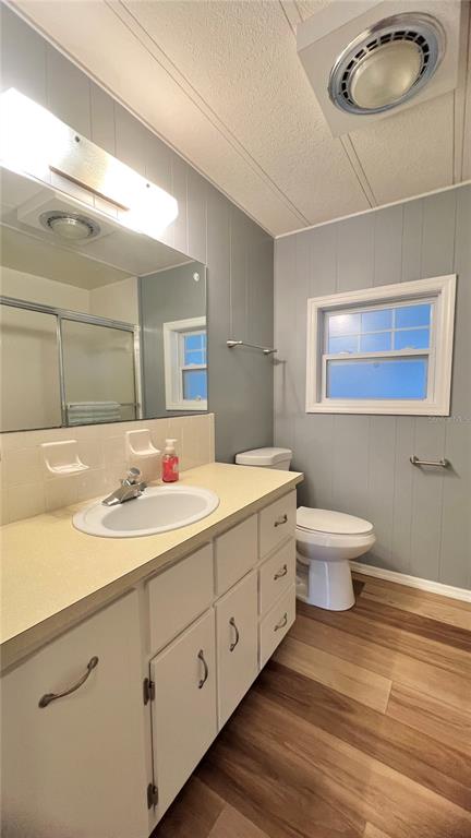 1100 South Belcher Road, Unit 657 Largo, FL 33771 - Photo 36 of 81 a bathroom with a double vanity sink toilet and a mirror