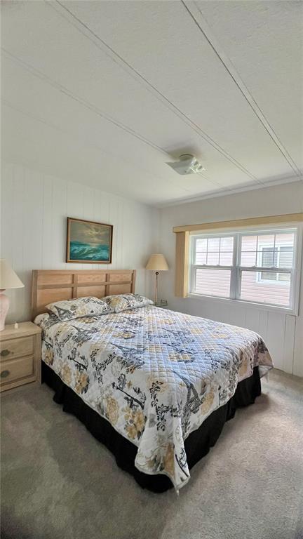 1100 South Belcher Road, Unit 657 Largo, FL 33771 - Photo 37 of 81 a bedroom with a bed and window