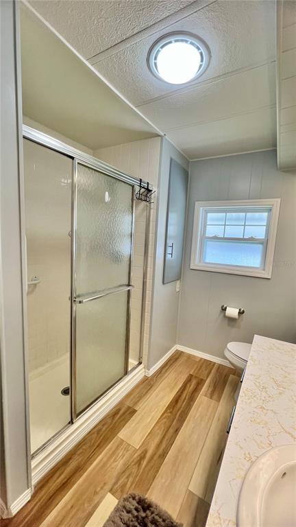 1100 South Belcher Road, Unit 657 Largo, FL 33771 - Photo 41 of 81 a bedroom with a bed and a mirror