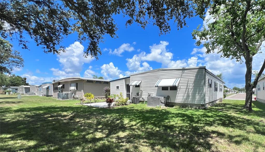 1100 South Belcher Road, Unit 657 Largo, FL 33771 - Photo 5 of 81 a front view of a house with garden