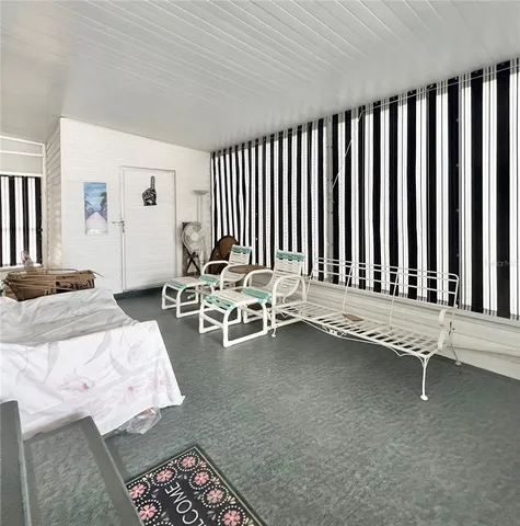 a spacious bathroom with stainless steel appliances granite countertop a sink and cabinets