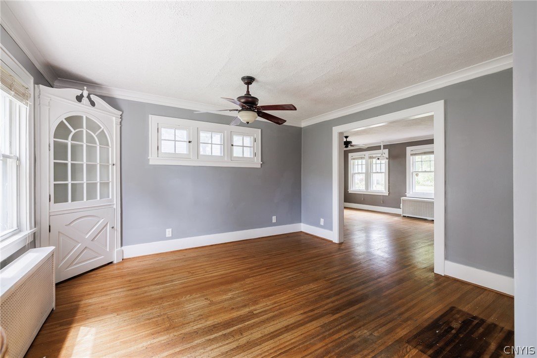 607 Laurelton Road Irondequoit, NY 14609 - Photo 7 of 22 Dining Room sits between the Kitchen and Living Room. A built in cabinet for additional storage.