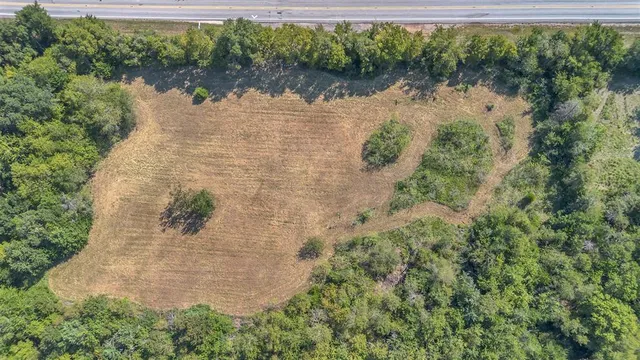 a view of a lake with a yard