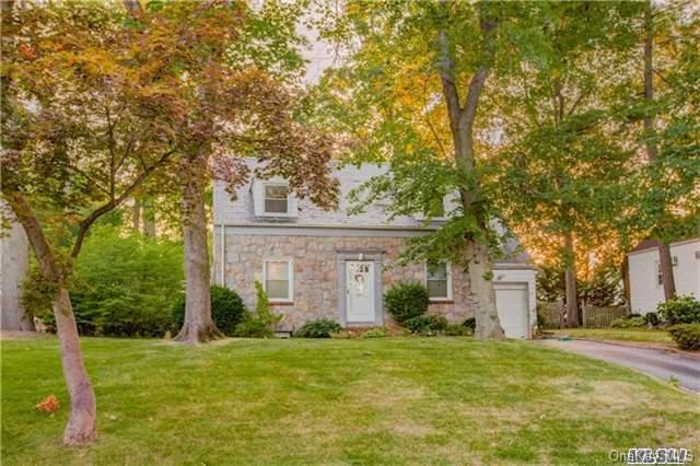 47 Rose Avenue Great Neck, NY 11021 - Photo 1 of 1 front view of a house with a yard